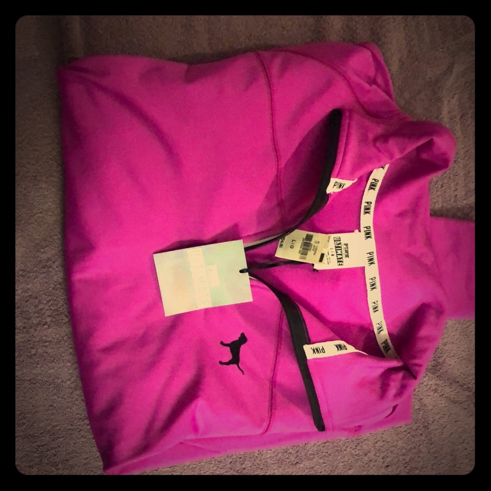 Pink track jacket.
